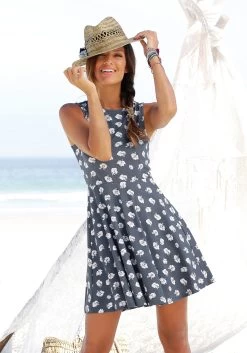 Beachtime Zomerjurk Met Broderie Anglaise -Beroemde Badkleding Winkel beachtime strandjurk met bloemenprint blauw